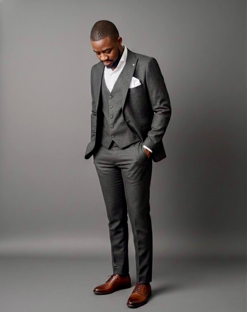 Groom in three piece suit